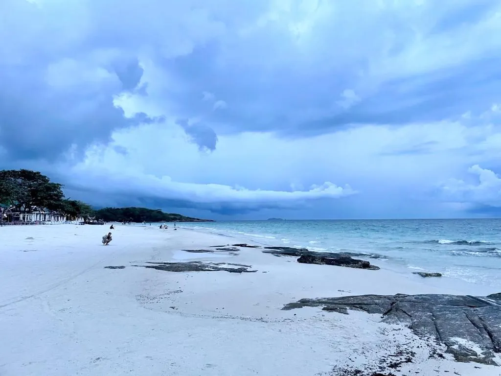 White beach under a dramatic sky on Koh Samet